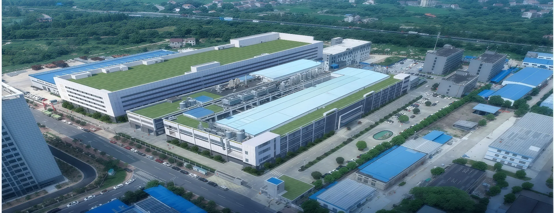 Aerial view of Senmax Technology's PCB manufacturing campus β multiple production buildings, rooftop utilities and on-site logistics