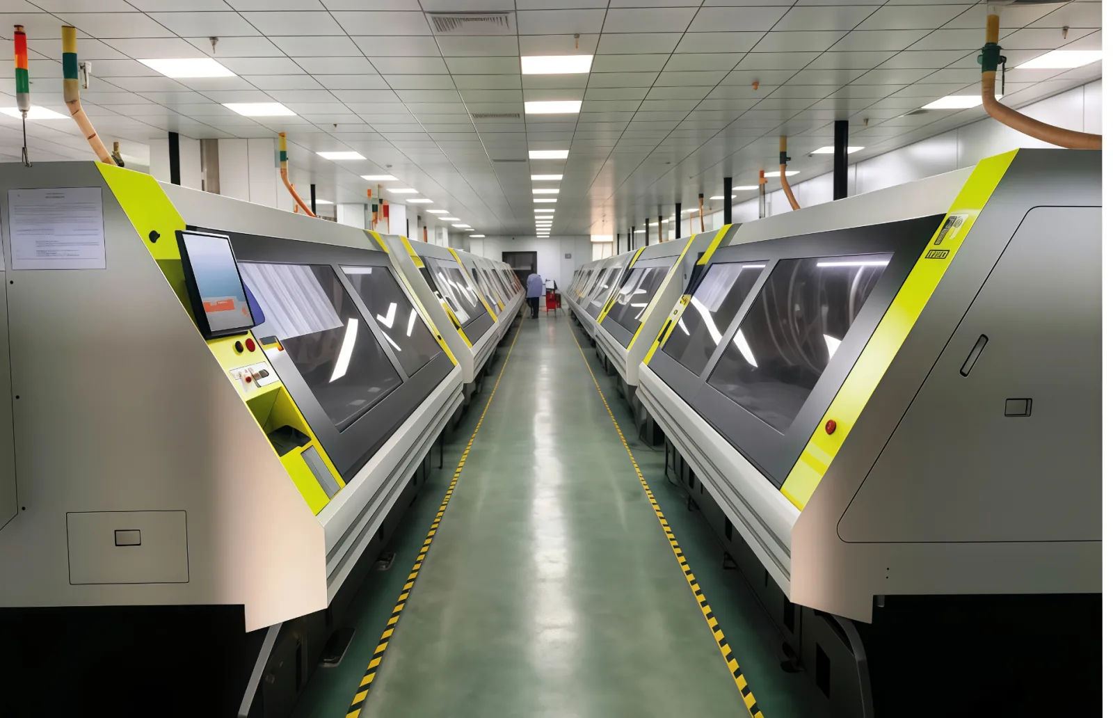 Long row of automated PCB exposure / imaging machines lined up in the production aisle