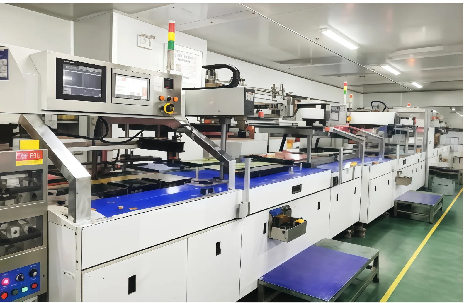 Automated screen printing line with touchscreen controls and inline conveyor handling
